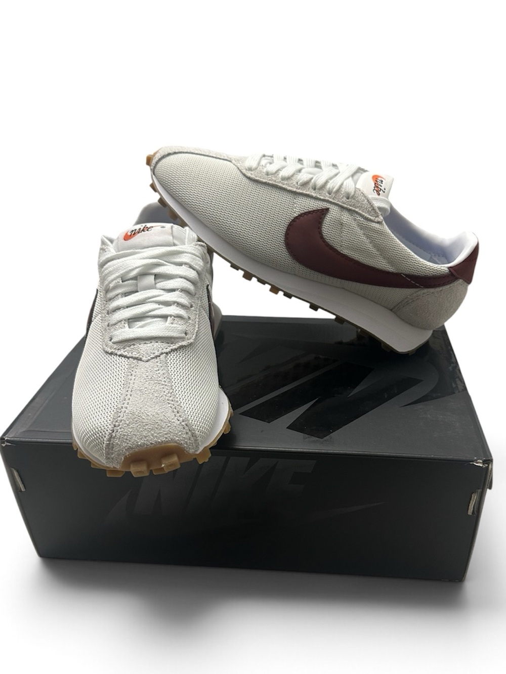 Nike Women's LD-1000 sneaker in the Summit White and Dark Team Red 6.5